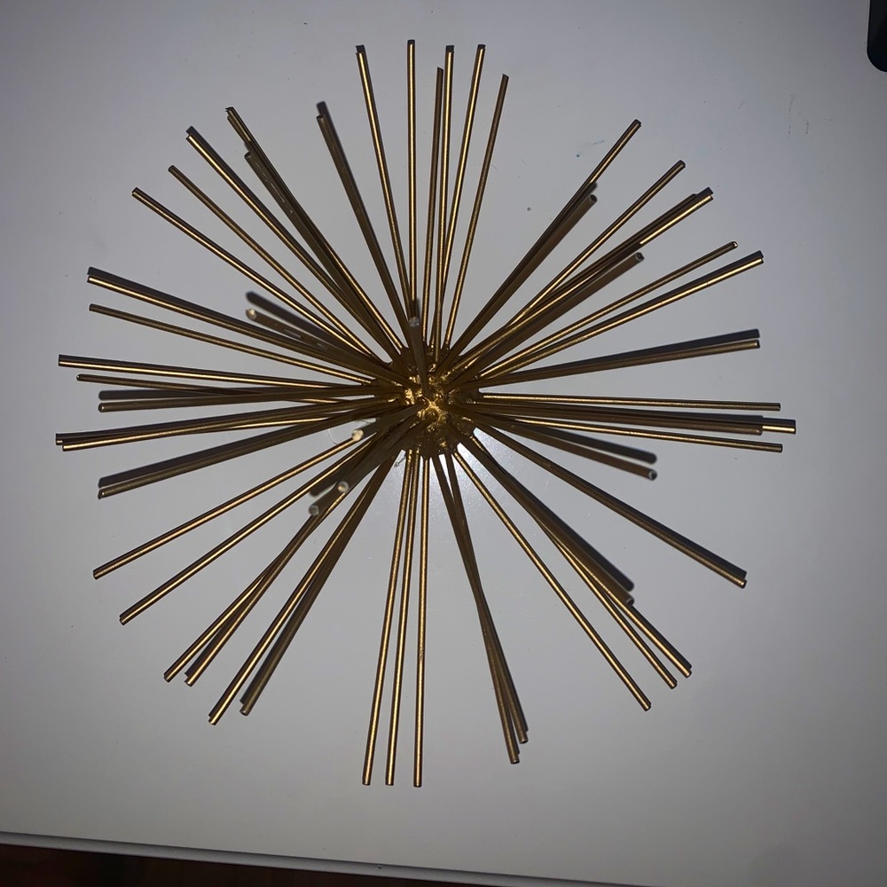 Spiky gold wall decor
